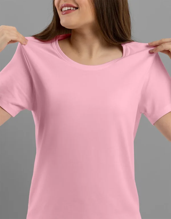 A plain, soft pink round-neck t-shirt for women from the Glow Mall brand, available for purchase online in India.
