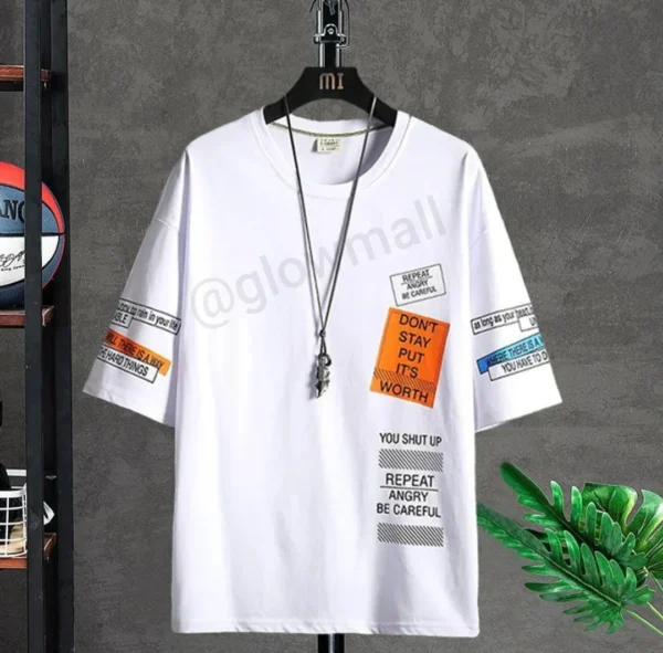 Urban Patchwork Printed T-shirt for men by Glow Mall in white, featuring Korean streetwear style with multiple statement text patches on the front and sleeves.