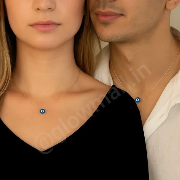A couple wearing matching gold-plated evil eye necklaces from Glow Mall, showcasing the minimalist and elegant unisex design.